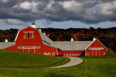 Pine Plains, NY USA  Farm buildings in the fall landscape. clipart