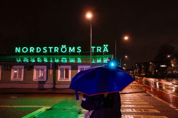 Stockholm Sweden Pedestrian Umbrella Walks Neon Sign Lumber Depot Nordstrom — Stock Photo, Image