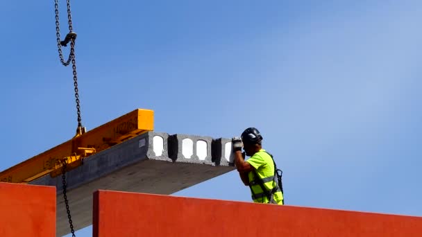 Malmo Sweden Construction Worker Downtown Handles Concrete Slab Crane — Stock Video