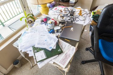 Solomons, Maryland USA, A cluttered desk and a computer clipart