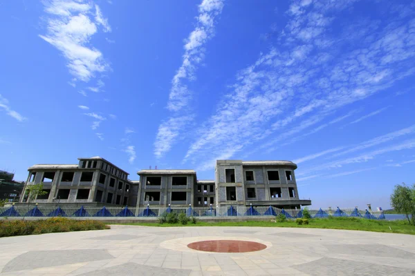 Unfinished buildings in a park — Stock Photo, Image