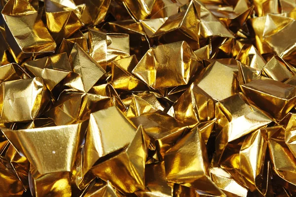 Piles of yellow Origami pieces — Stock Photo, Image