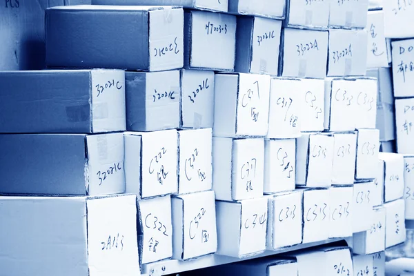 Goods paper boxes piled up together — Stock Photo, Image