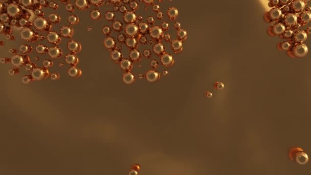 Золоті блискучі кульки котяться зверху в басейн або екран на золотому тлі. Розкішна анімація глянцевих сфер заповнює об'єм. 4k 3D рендеринг — стокове відео