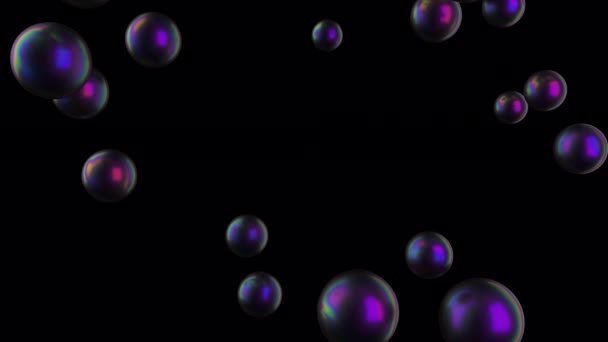 光沢のあるボールは黒い背景のプールやスクリーンに落ちます。虹彩球のアニメーションは、ボリュームを埋める.アルファで透明性のある3Dレンダリング. — ストック動画