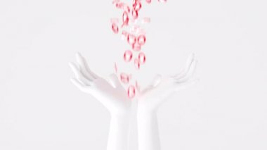 Düşen kırmızı kalp sembolleri, açık beyaz ellerdeki gibi. Sosyal medya popülerliği kavramı. Akış 3d animasyonu gibi favori gönderi.