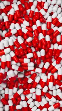 Beyaz ve kırmızı haplar yavaş çekimde karışıp dönüyorlar. İlaçlar, haplar, haplar, ilaç konsepti. 3d canlandırma canlandırması.