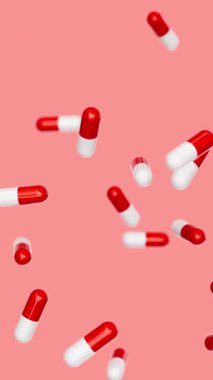 Beyaz, kırmızı kapsüller yavaşça kırmızı zemine çarpar. İlaçlar, haplar, haplar, ilaç konsepti. 3d canlandırma döngüsü oluşturulabilir.