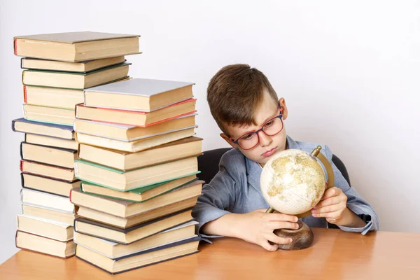 Education Concept Student Does Homework Studies Globe Has Books Both — Stock Photo, Image