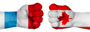İnsanların mücadelesi kavramı. İki el birbirine kenetlenir ve birbirlerinin karşısındadır. Ülkelerin bayraklarının renklerine boyanmış eller. Kanada Lüksemburg 'a Karşı