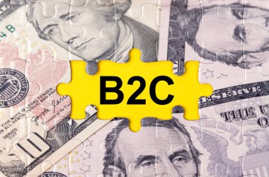 İş konsepti. Yazıtın ortasında doların görüntüsüyle bulmaca - B2C