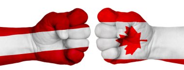 İnsanların mücadelesi kavramı. İki el birbirine kenetlenir ve birbirlerinin karşısındadır. Ülkelerin bayraklarının renklerine boyanmış eller. Kanada Peru 'ya Karşı