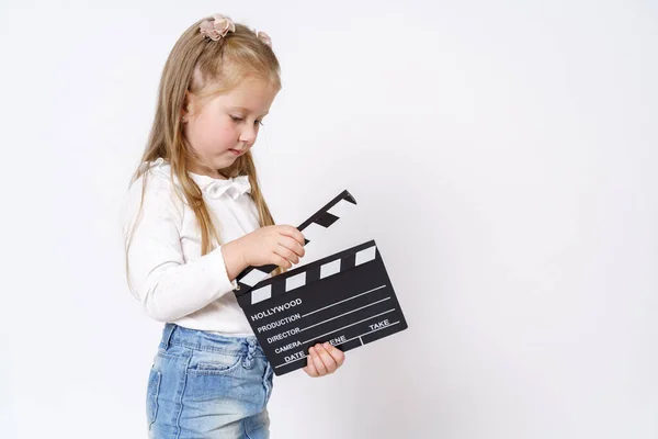 Barnens Koncept Flicka Som Håller Ett Skrivbord Sina Händer Isolerad — Stockfoto