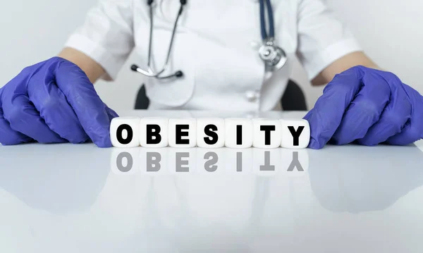 Medicine Health Concept Doctor Put Together Word Cubes Obesity — Stock Photo, Image