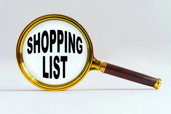 Finance Economics Concept Magnifier White Background Text Written Shopping List — Stock Photo, Image