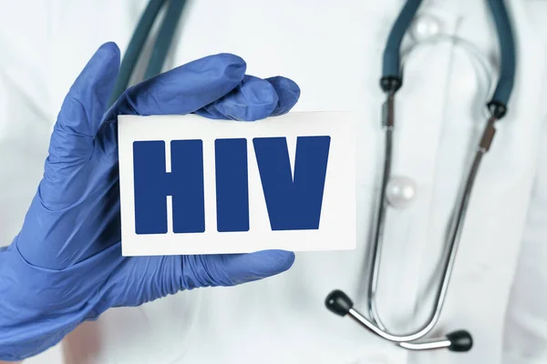 Medicine Concept Doctor Holds Business Card Says Hiv — Stock Photo, Image