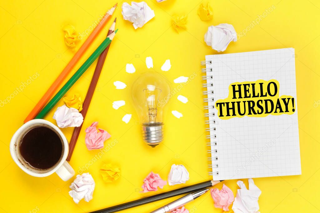 Business and education concept. On a yellow background, a cup of coffee, a light bulb, pencils, a notebook with the inscription - HELLO THURSDAY