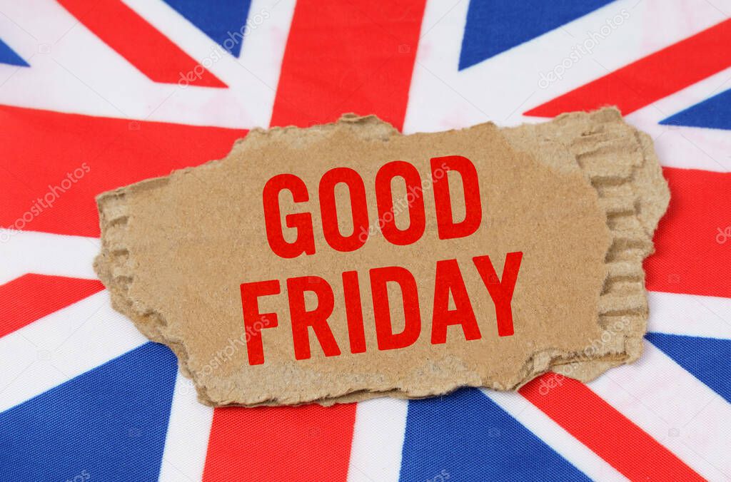Holidays of the UK. Against the background of the flag of Great Britain lies cardboard with the inscription - Good Friday