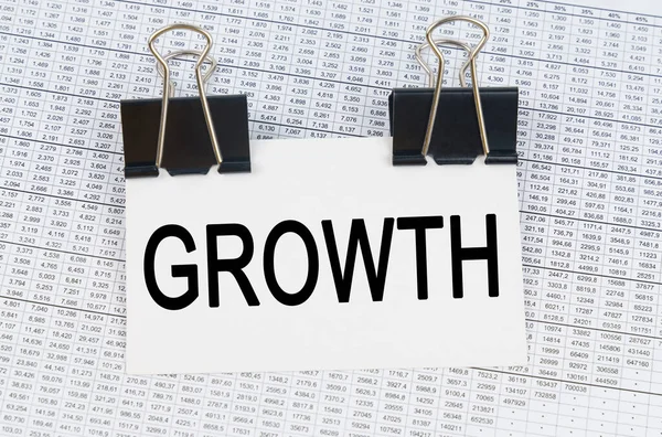Üzleti Pénzügyi Koncepció Asztalon Vannak Jelentések Egy Névjegykártya Felirattal Növekedés — Stock Fotó