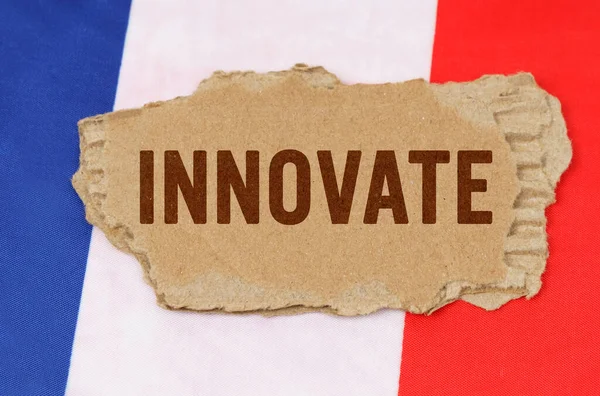 Üzleti Pénzügyi Koncepció Háttér Francia Zászló Fekszik Karton Felirattal Innováció — Stock Fotó