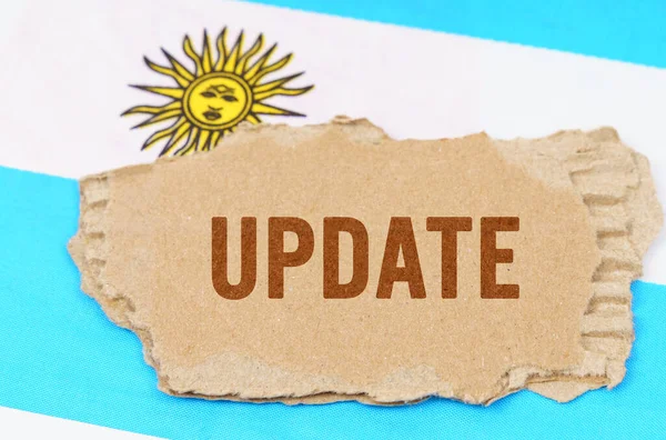 Business Finance Concept Background Flag Argentina Lies Cardboard Inscription Update — Stockfoto