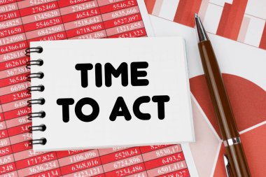 Business and finance concept. On financial documents and charts there is a notebook with the inscription - Time To Act