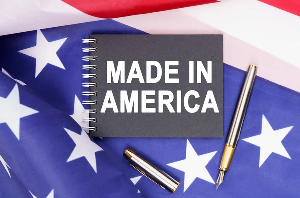 American Concept Flag Has Pen Notebook Inscription Made America — Stock Photo, Image