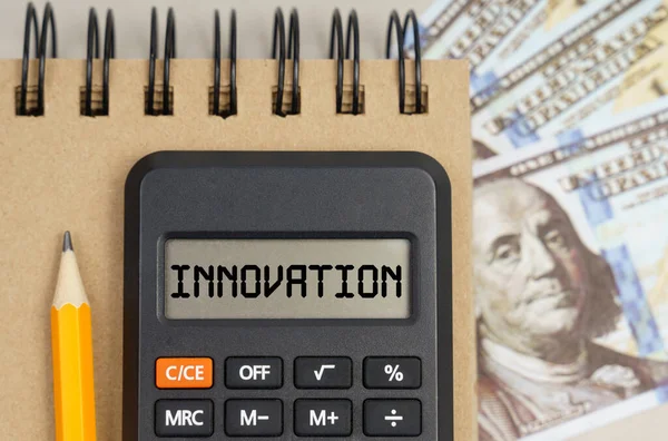 Finans Kavramı Masanın Üzerinde Dolar Bir Defter Üzerinde Innovation Yazan — Stok fotoğraf