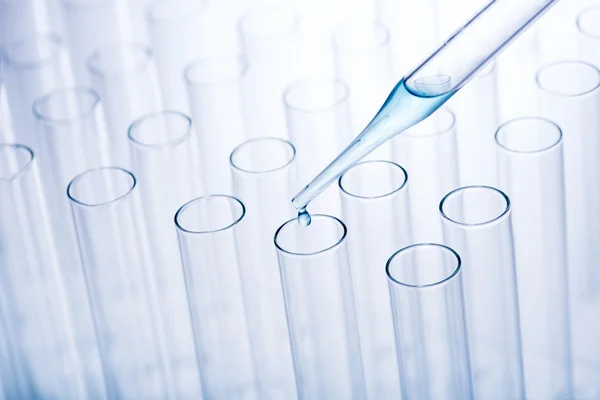 Test tubes and pipette — Stock Photo, Image