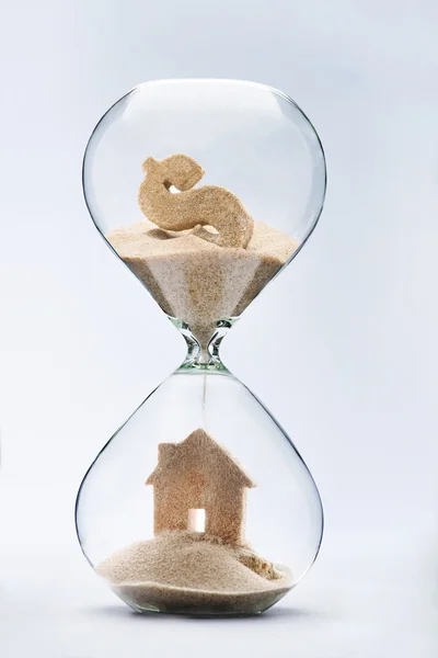 Hourglass house mortgage concept — Stockfoto