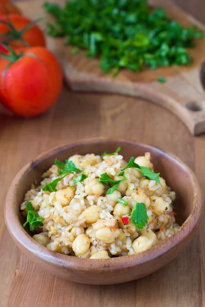 Chickpeas with rice and tomato sauce. Healthy vegan food — Stock Photo, Image
