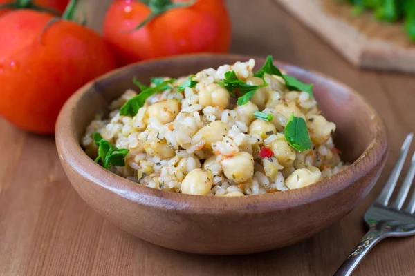 Chickpeas with rice and tomato sauce. Healthy vegan food — Stock Photo, Image