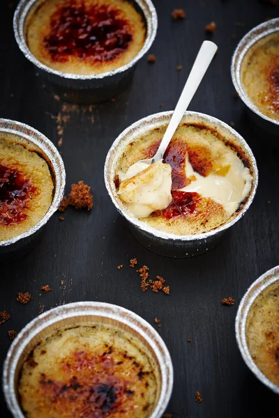 Creme brulee on a dark background — Stock Photo, Image