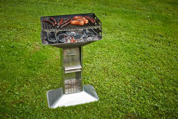 Sausages on grill — Stock Photo, Image
