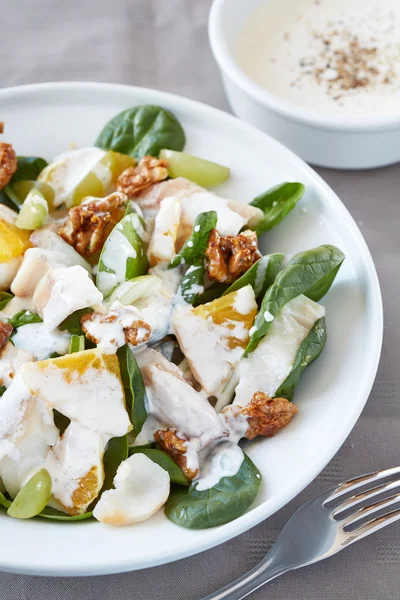 Fish salad  with oranges and nuts — Stock Photo, Image