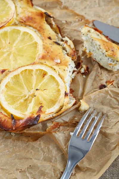Kisch with fish and slices of lemons — Stock Photo, Image