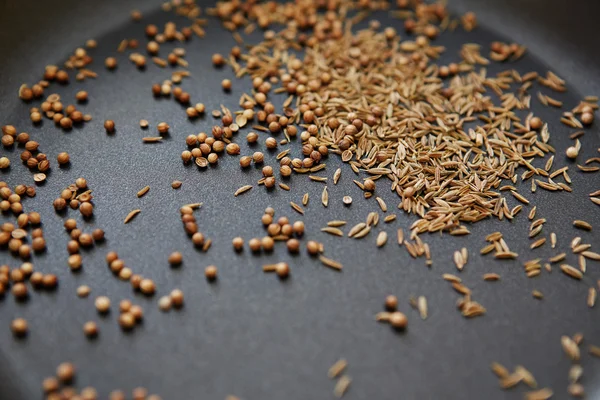 Coriander and cumin seeds — Stock Photo, Image