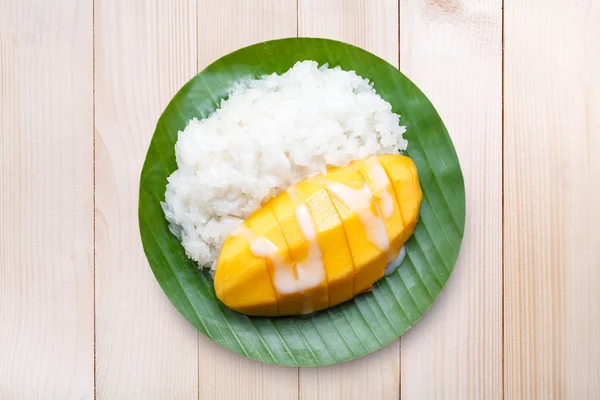 Dessert sweet sticky rice with mango coconut milk on wood — Stock Photo, Image