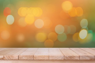 ahşap masa üstü bokeh turuncu arka plan üzerinde kahverengi - b olabilir