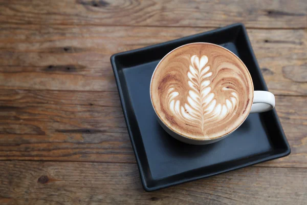 Kop af mokka kaffe på træbord - Stock-foto