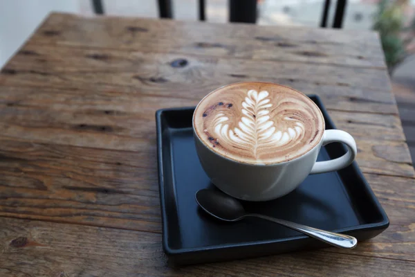 A cup of coffee mocha on wooden — Stock Photo, Image