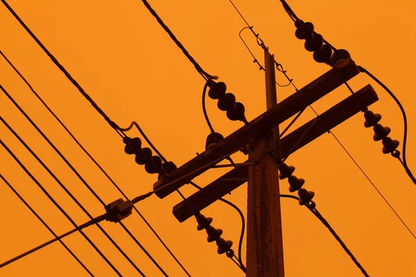 Pilares eléctricos al atardecer — Foto de Stock