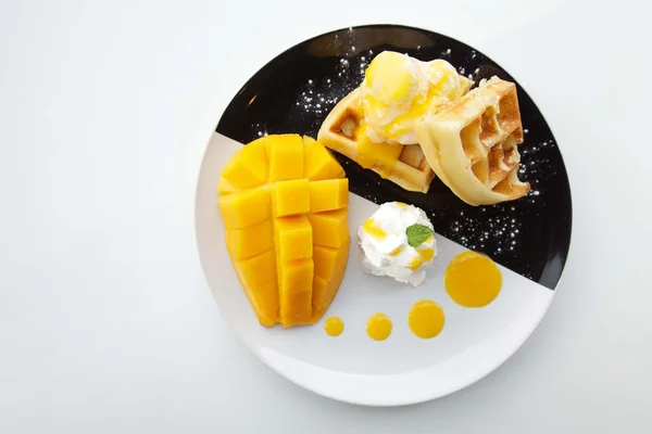 Waffles with ice cream and mango — Stock Photo, Image