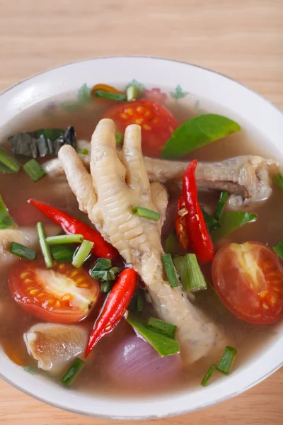Sour and spicy chicken feet soup — Stock Photo, Image