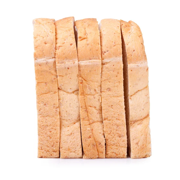 背景の全粒小麦のパンのスライス — ストック写真