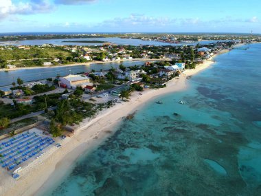 The aerial view of the resorts along the shore with private white beaches near Grand Turk, Turks & Caicos
