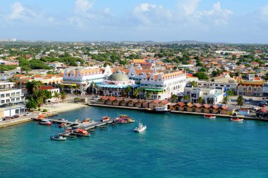 Oranjestad, Aruba - November 17, 2018 - The aerial view of the ports, boats and buildings along the harbor clipart