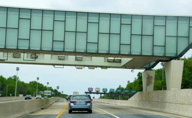 Elkton, Maryland, U.S.A - May 17, 2021 - The EZPass highway toll scanners on Interstate 95 South clipart