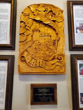 Lititz, Pennsylvania, U.S.A - Sep 13, 2025 - The gold painted wood carving of Lititz Castle originated from an old Linden tree in Zamberk, Czech Republic, gifted by the Viola Children's Choir.