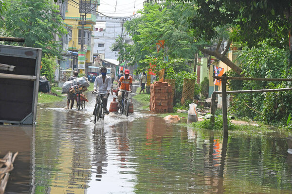 Burdwan Town, Purba Bardhaman District, West Bengal / India - 23.05.2021: A waterlogged street due to rain in Burdwan town.